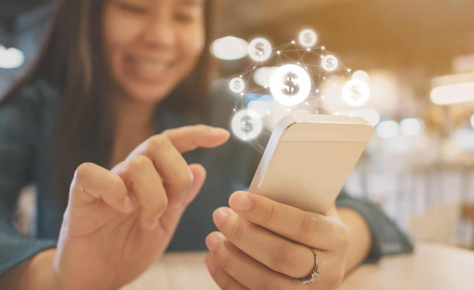 Teen using mobile phone with online transaction application, Concept financial technology (fin-tech)