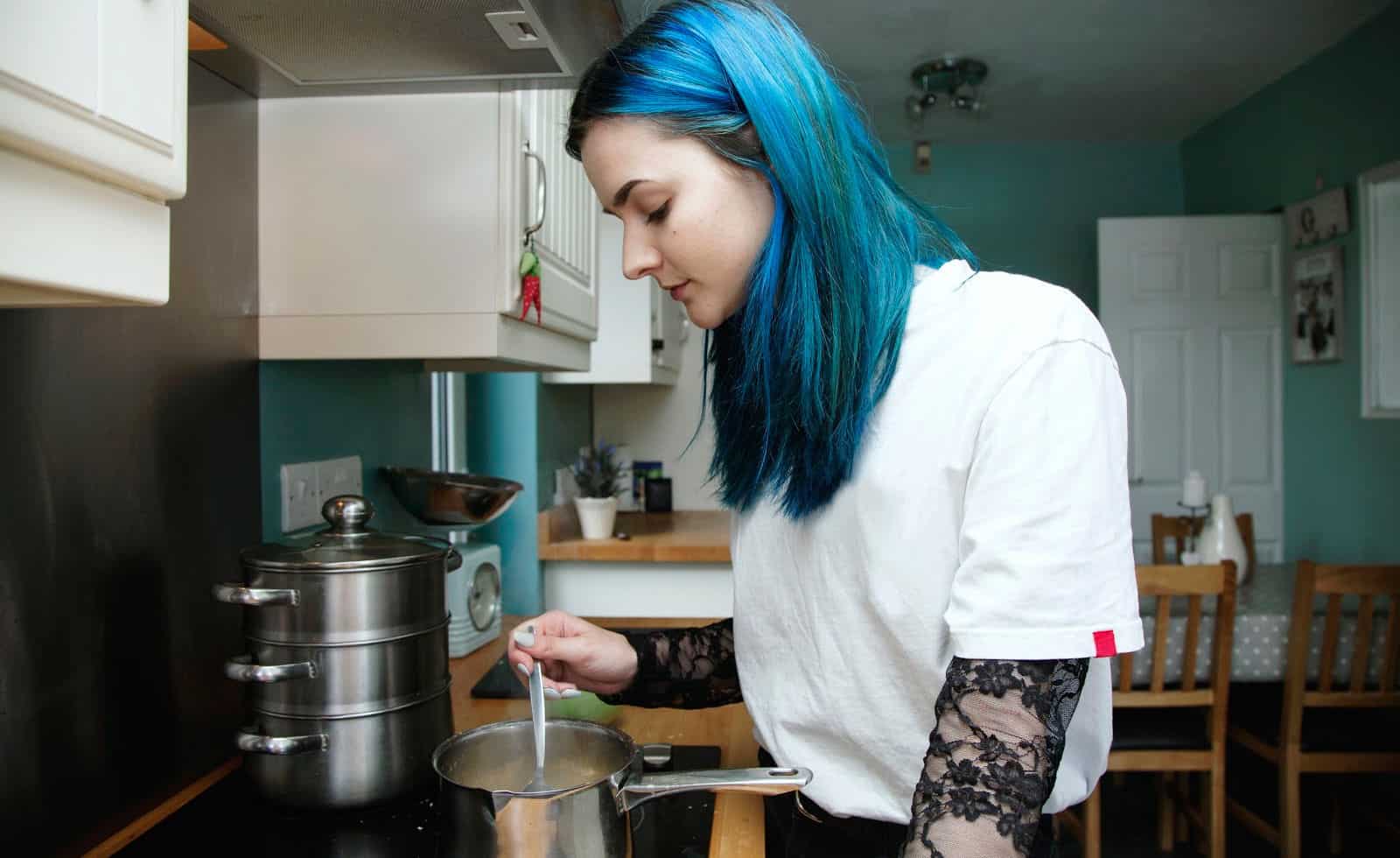 Teenager practicing life skills before going off to college