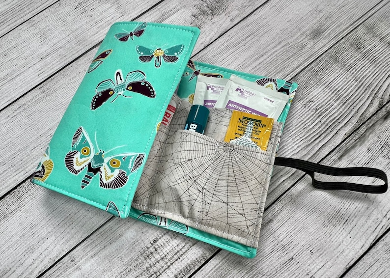 15 Handmade Teacher Gifts That You Can Buy on Etsy 8 Boho Butterfly First Aid Fabric Travel Kit Fabric Travel