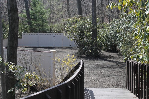 Stroll across the wooden bridge to this romantic courtyard at the Woodlands Inn. Perfect spot for a proposal!